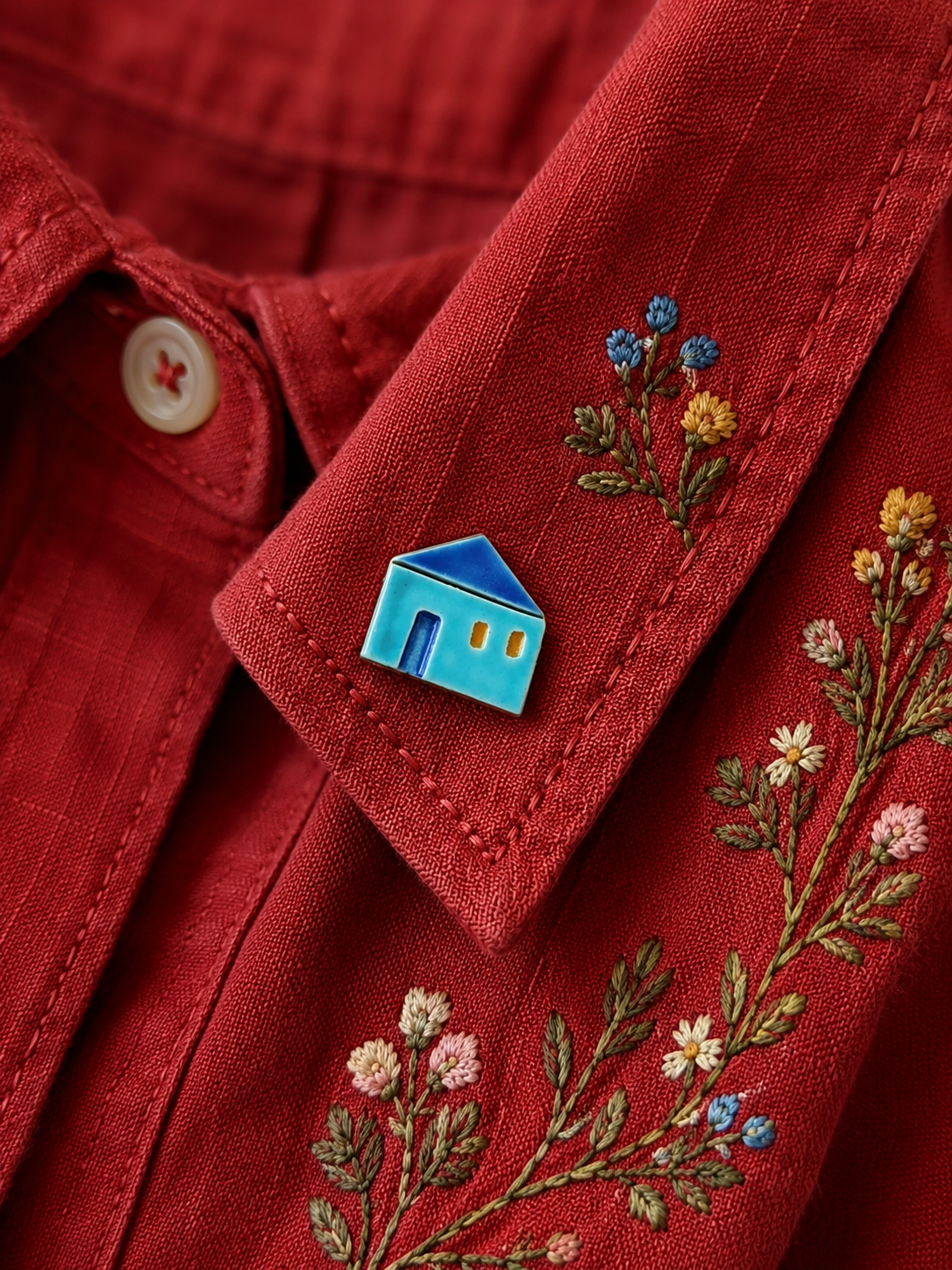 Ceramic house pin worn on clothing